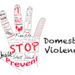 Hand that reads stop Domestic Violence